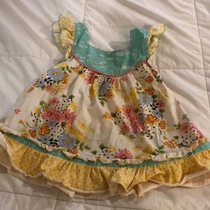 Adorable ruffle sleeved tank with ruffle sleeve